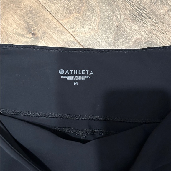 Athleta black pants size medium 
Zipper pocket small slit on ankle side of leg - Picture 2 of 8